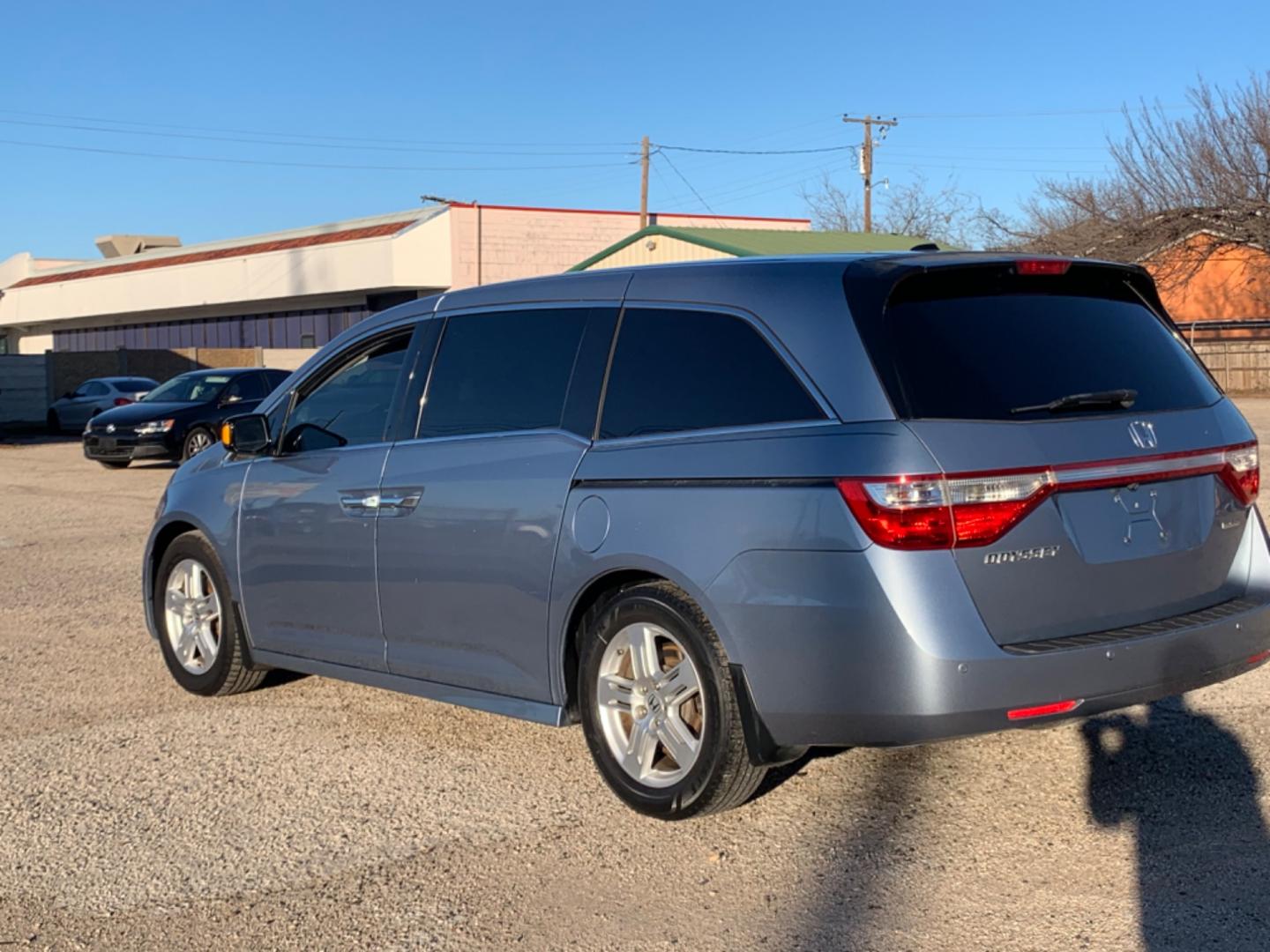 2012 Blue /gray Honda Odyssey Touring (5FNRL5H94CB) with an 3.7L L5 DOHC 20V engine, AUTOMATIC transmission, located at 1830 North Belt Line Road, Irving, TX, 75061, (469) 524-0199, 32.834373, -96.993584 - Photo#3